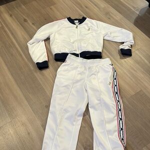 Champion track set. White with red and blue accents. Women size medium.